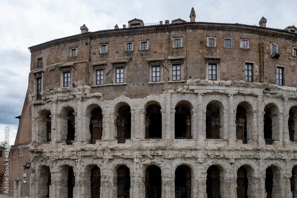 Obraz premium Architectural history in details of ruins, old buildings, walls, amfitheatres, arches in old part of Rome, dated from 300 BC, guided tours in Rome, Italy