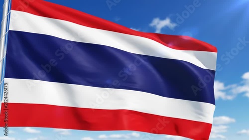 Thailand Flag Fluttering Against Bright Blue Sky
