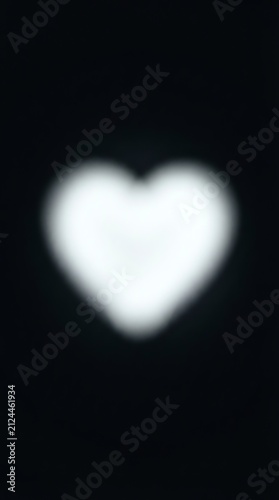 Bright Heart Shape Glow on Dark Background.