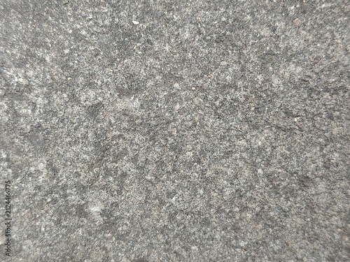 Close-up Texture of Speckled Gray and Green Granite Stone Surface.