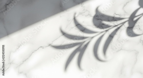 Closeup of marble surface with leaf pattern.
