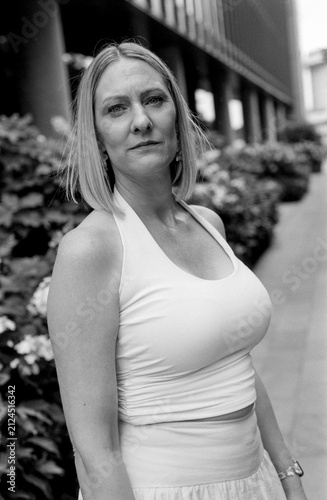 Photography Woman posing outdoors in black and white film portrait