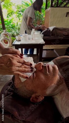 Male facial cleansing and moisturizing massage