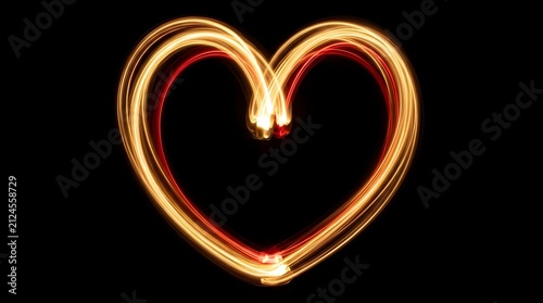 Glowing Light Painting Heart Symbol on Dark Background