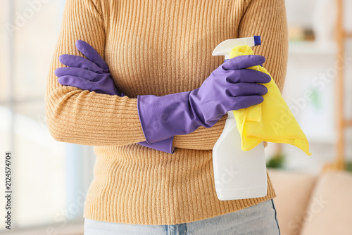 Young woman with detergent ...