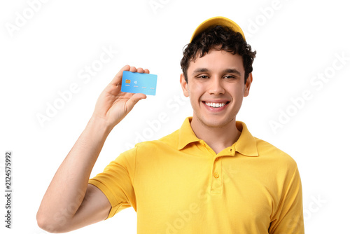 Young male cashier with cre...