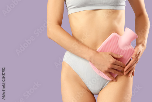 Young woman in panties with...
