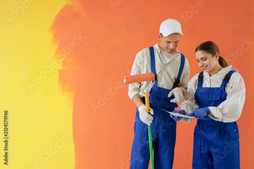 Young couple with house pla...