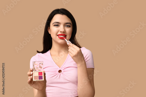 Beautiful young woman with ...