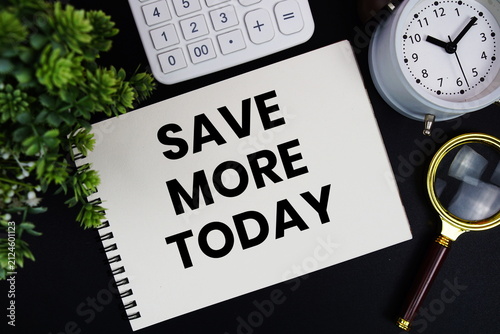 Картината върху платно Save More Today text written on notepad with alarm clock, magnifying glass and c