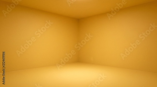 Empty room corner with yellow illumination studio shot