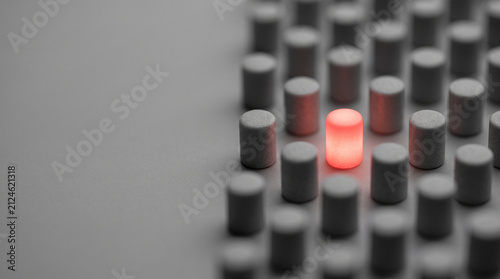 Single glowing genetic anomaly isolated in grey field