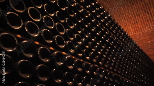 Stacked Wine Bottles in Queretaro Cellar With Brick Ceiling 