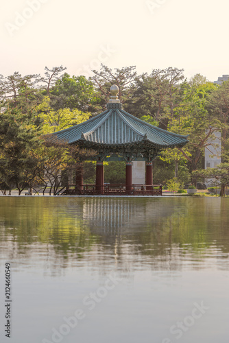 Canvastavla Traditional Korean pavilion with perfect reflection in calm lake water vertical