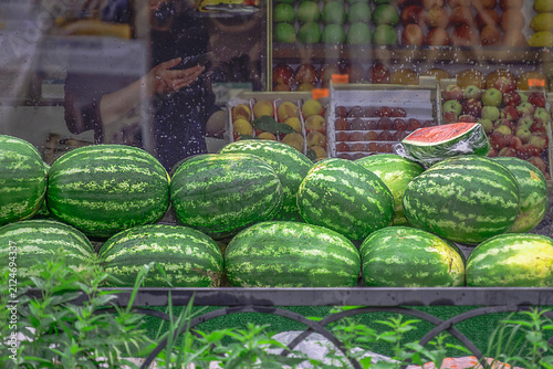 Fruit vendor's kiosk on the street on a summer day