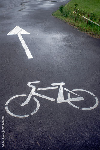 Marking on a bike path in a city park on a summer day