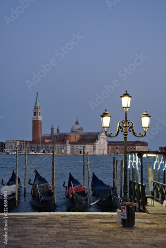 Gondolas in Venice with the island of San Giorgio in the background.