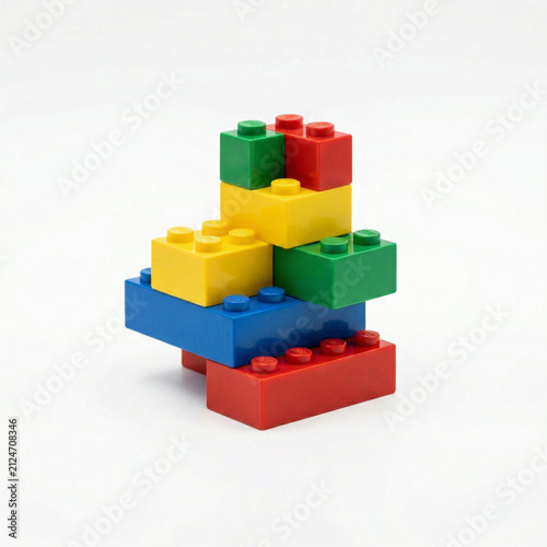 Colorful building blocks stacked in creative arrangement on white background  
