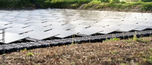 Foto Solar cells, solar farms on surface mounting management, alternative energy and