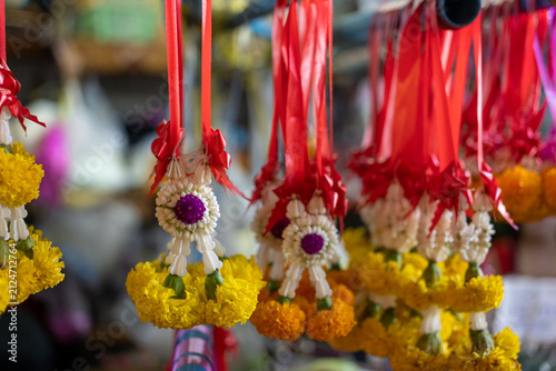 Canvas Print Thai Jasmine and Marigold Garlands Hanging on Display, Surat Thani, Thailand