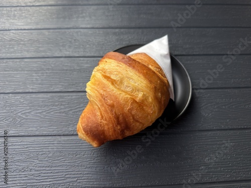 croissant on a black table