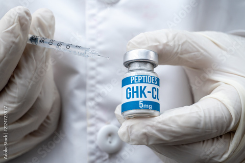 Принти на полотні Doctor in Gloves Holding Insulin Syringe with Droplet and GHK-CU Peptide Vial