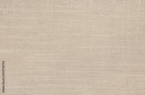 Brown linen fabric cloth texture for background, natural textile pattern.