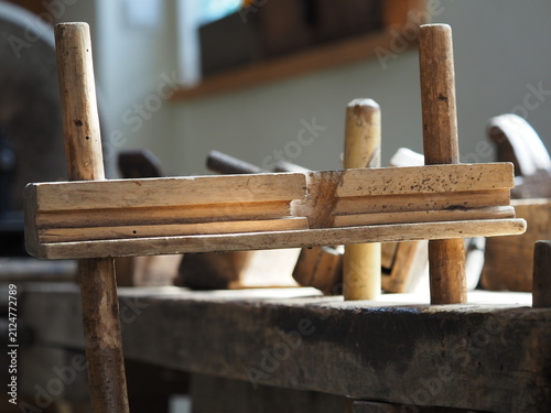Wooden gripper on a workbench