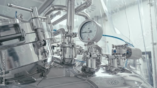 Precision pressure gauges measuring vital metrics in modern lab. Equipment at medical industry. Equipment and sense of scientific innovation. Factory machine at work. Production process.
