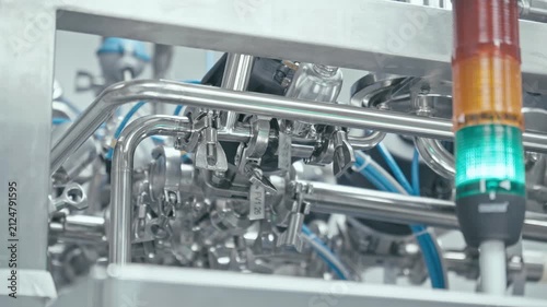 Production equipment at medical industry. Complex machinery showcases intricate designs and precision at facility