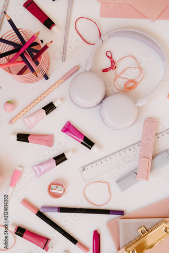 Top View Pink Stationery And Art Tools Setup On White Table