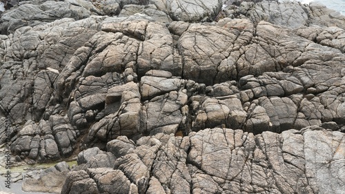 The rough rocky stone shore near the oceaon