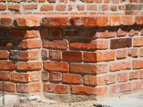 Corner of a red brick wall