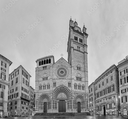 Genoa Cathedral facade and tower with surrounding buildings