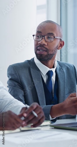 Business, team and men with laptop in meeting, talking and budget review on web or financial report. Office, discussion and black people with ideas, wealth management collaboration with technology