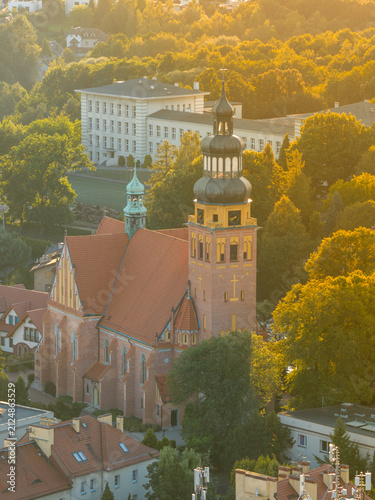 Quadro su tela Catholic parish of saints peter and paul church in puck, poland during sunset