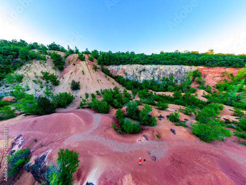 Quadro su tela Aerial view of the red bauxite landscape in Gánt, Hungary