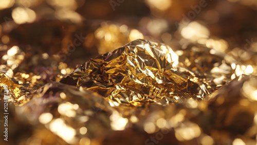 Close up of crumpled golden foil texture background.