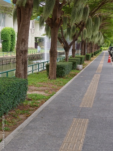 Path way in park beside canel.