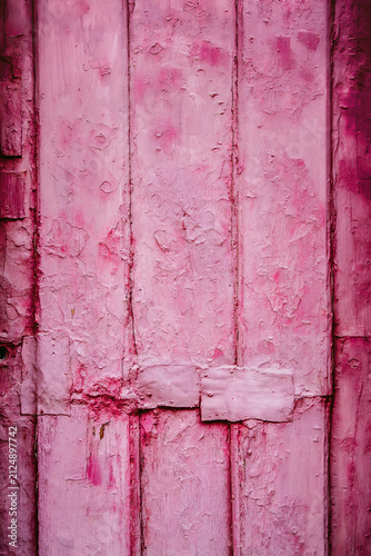 Rustic old wood door painted pink