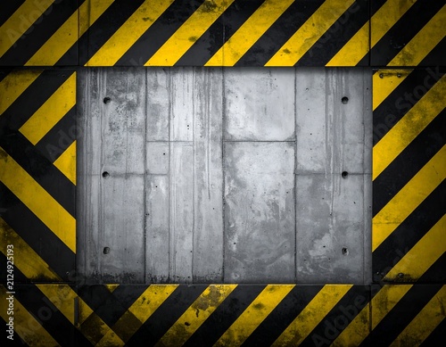 Concrete panel surrounded by yellow and black hazard stripes, creating a warning frame
