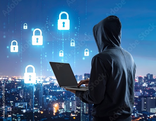 Silhouette of a hooded person using a laptop with glowing security locks over a cityscape