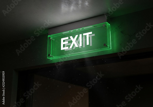 Modern Illuminated Green Exit Sign Mounted Above an Interior Door