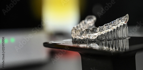 
3D-printed plastic dental splint for tooth correction or use as an occlusal splint (bite guard) – produced by dentists or dental laboratories for conditions such as bruxism.