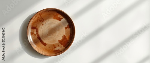 Wooden Bowl on a Light Back...