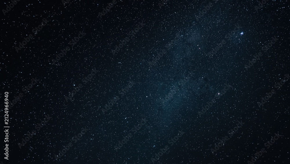 Fototapeta premium Twinkling Stars in a Clear Night Sky with Deep Blue Background