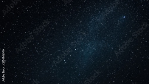 Twinkling Stars in a Clear Night Sky with Deep Blue Background