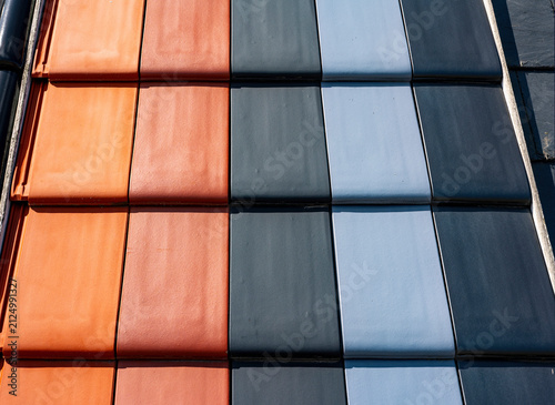 Color variation of modern roof tiles in red black and orange