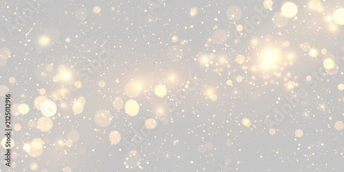 Golden shimmering bokeh lights scattered on a dark background with glowing sparkles on transparent background