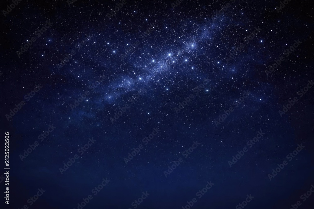 Obraz premium Starry Night Sky with Bright Stars Against a Deep Blue Background